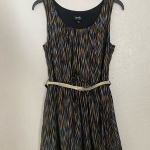 Black, gold, and silver dress